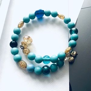 Shades of blue with gold accents memory bracelet, n w